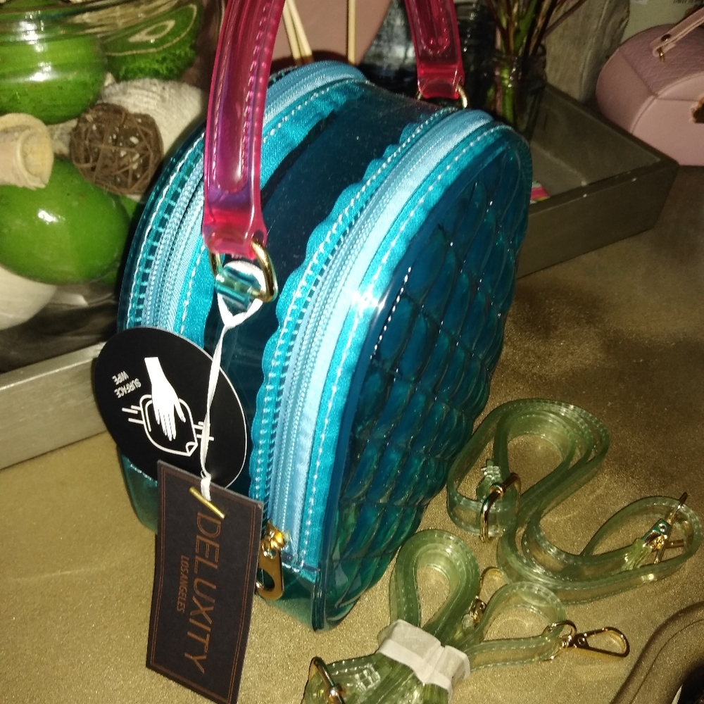 Quilted versatile jelly bowler bag/backpack.